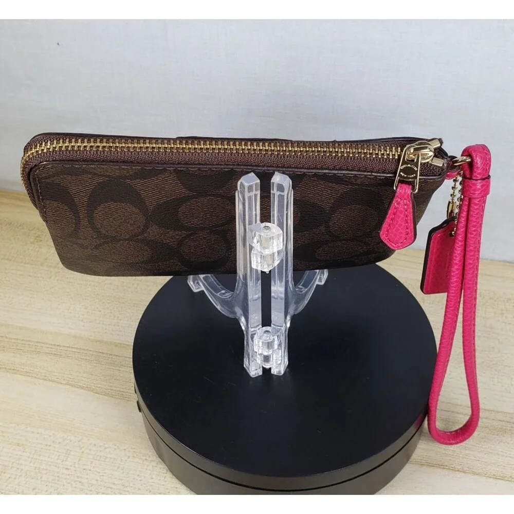 COACH Corner Zip Wristlet In Dark Brown Signature Leather w/ Hot Pink Stripe